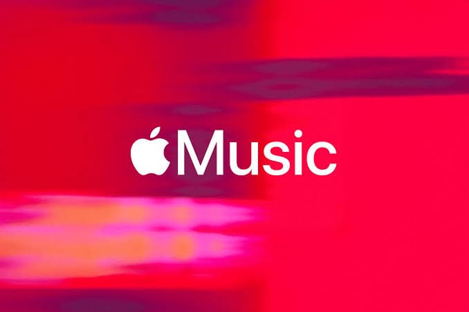 Apple Music white wordmark on a red and pink background